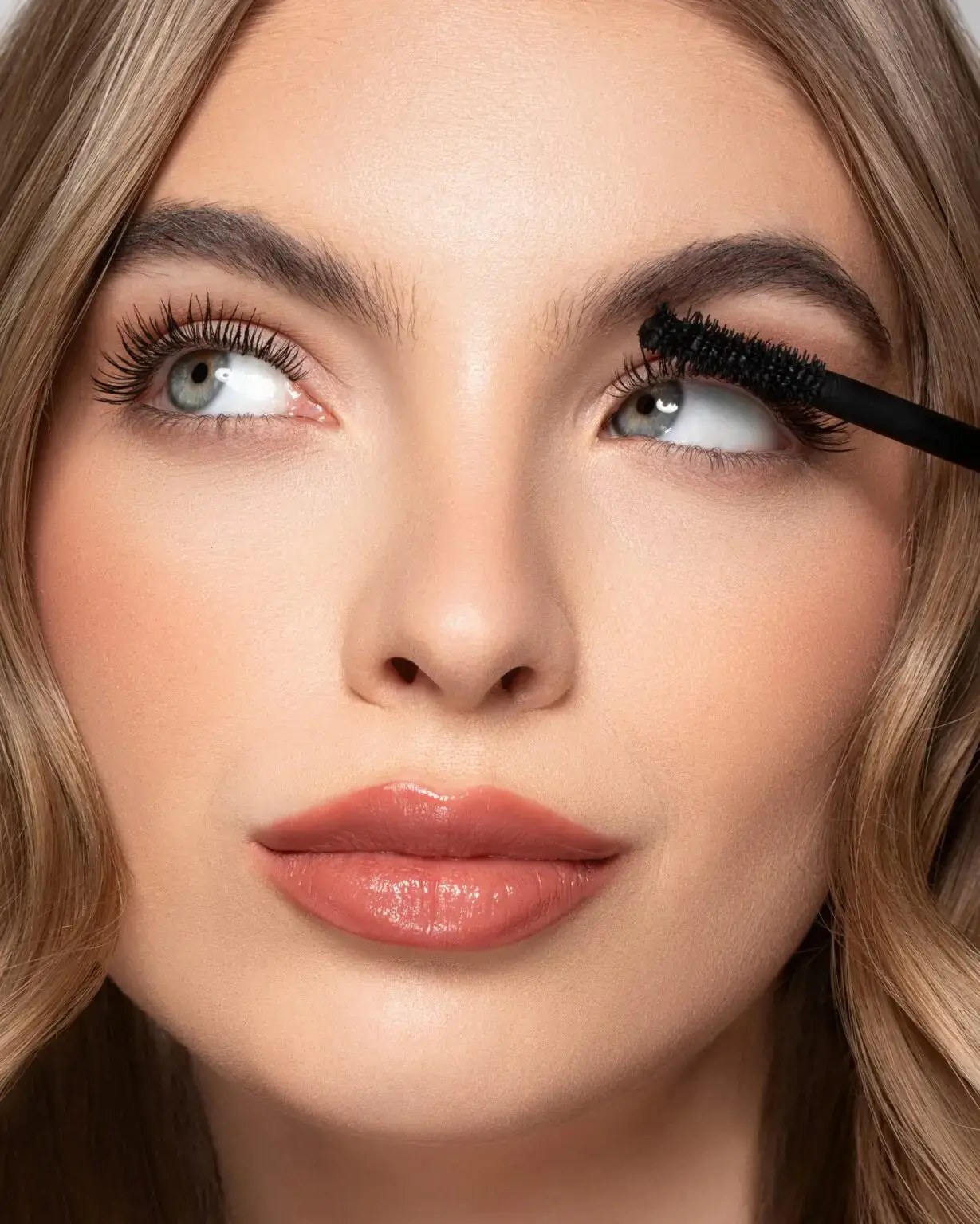 Applying mascara The Beauty Brand